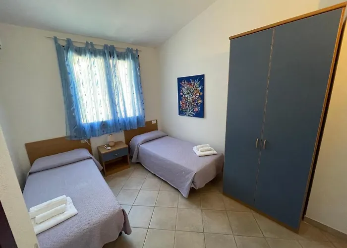 アパートホテル Il Borgo Di Porto Corallo